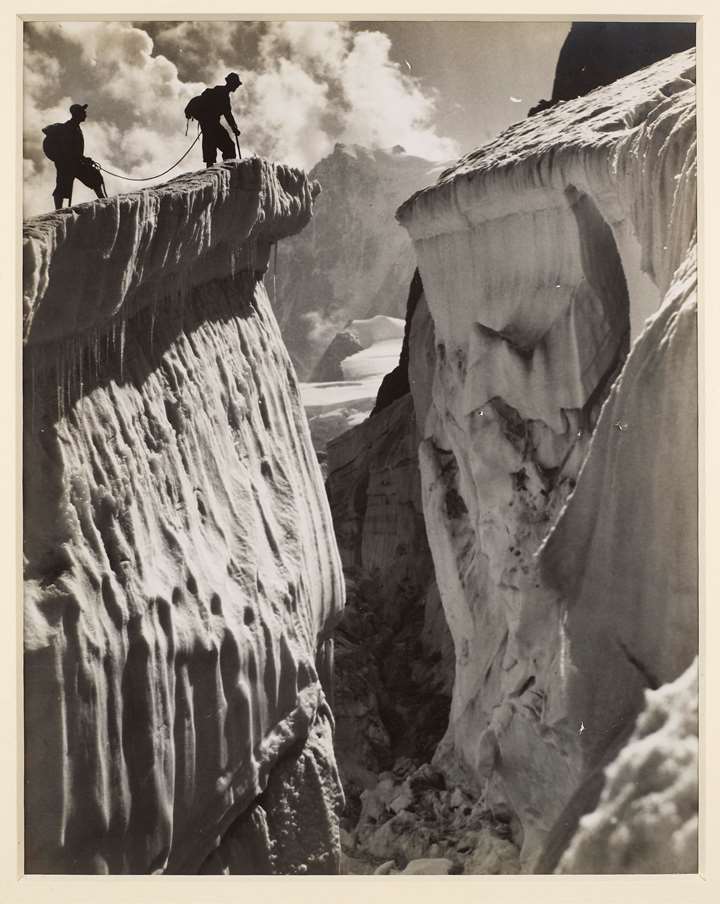Climbers on crevasses below the Aiguille du Requin, Chamonix.